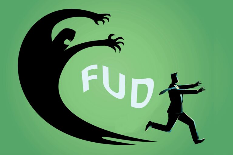 A graphic of a person in a suite, running from their own shadow, with the letters F.U.D. trailing between them - image